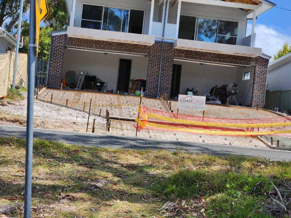 Two-Story Duplex Under Construction with Exposed Framing — Coastcrete Concrete Specialist in Taylors Beach, NSW