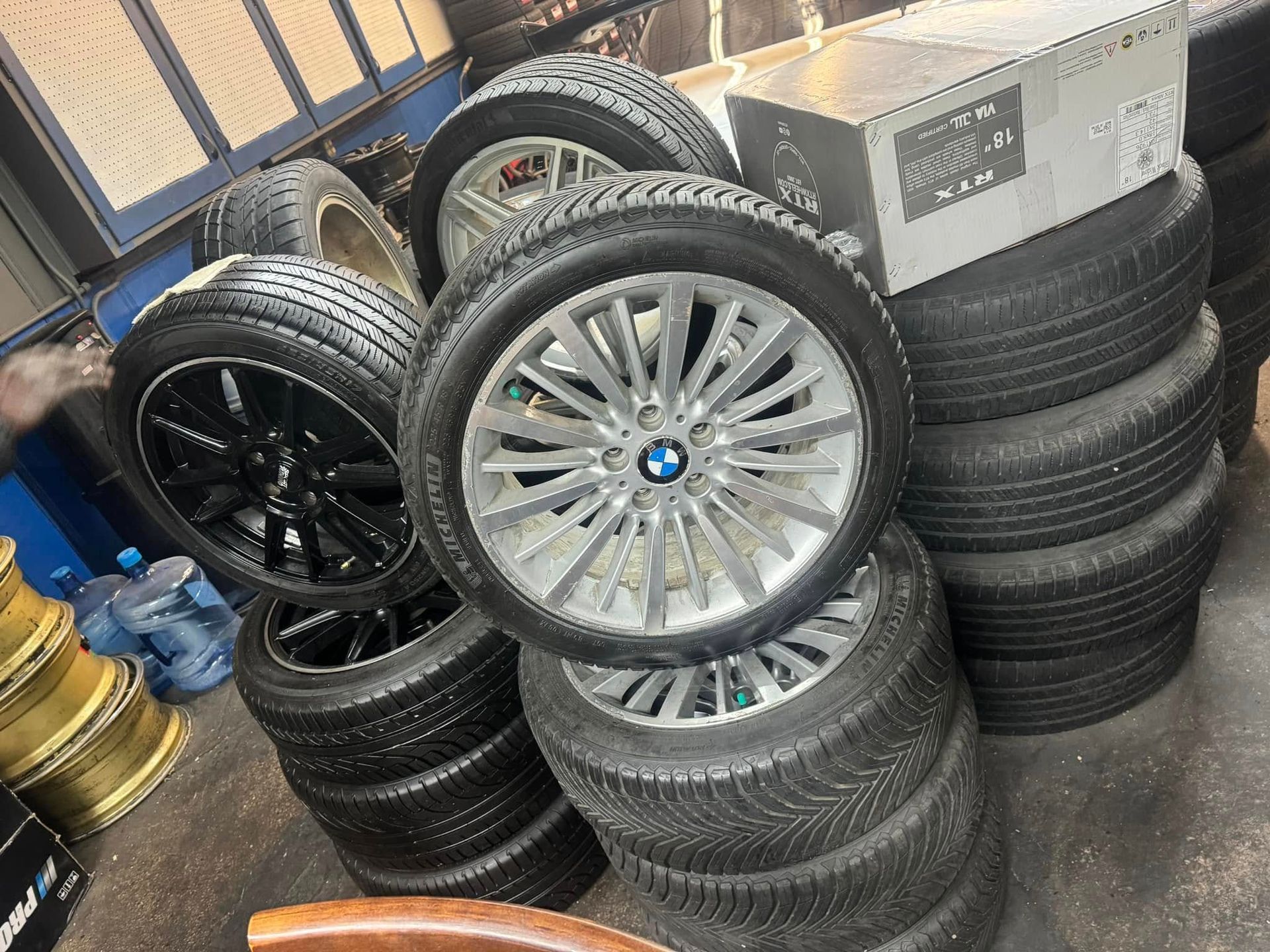 A store filled with lots of tires and a fire extinguisher.