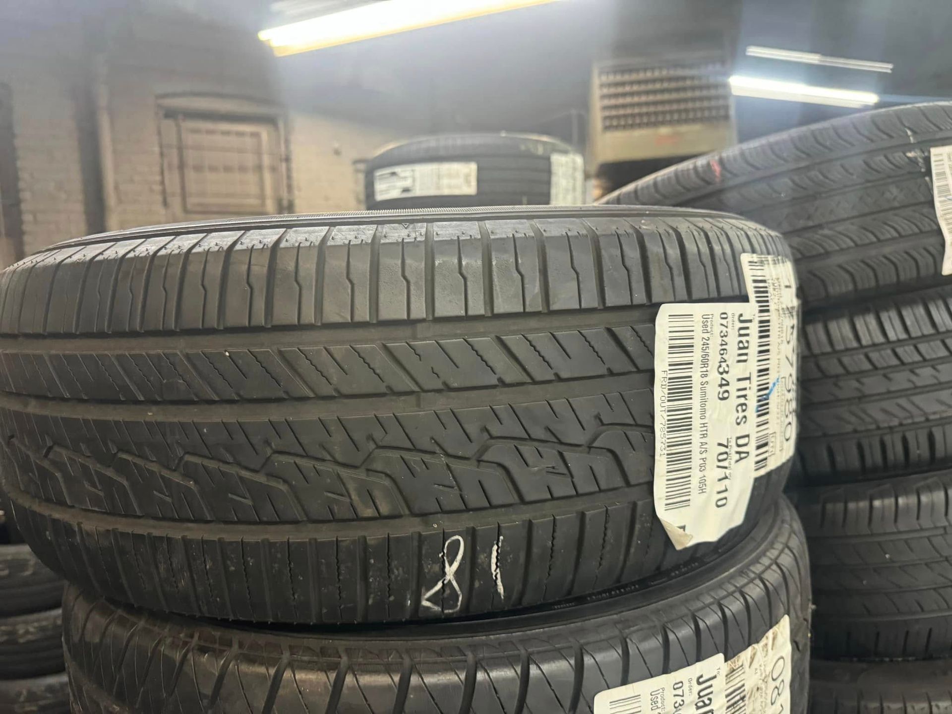 Several tires are stacked on top of each other