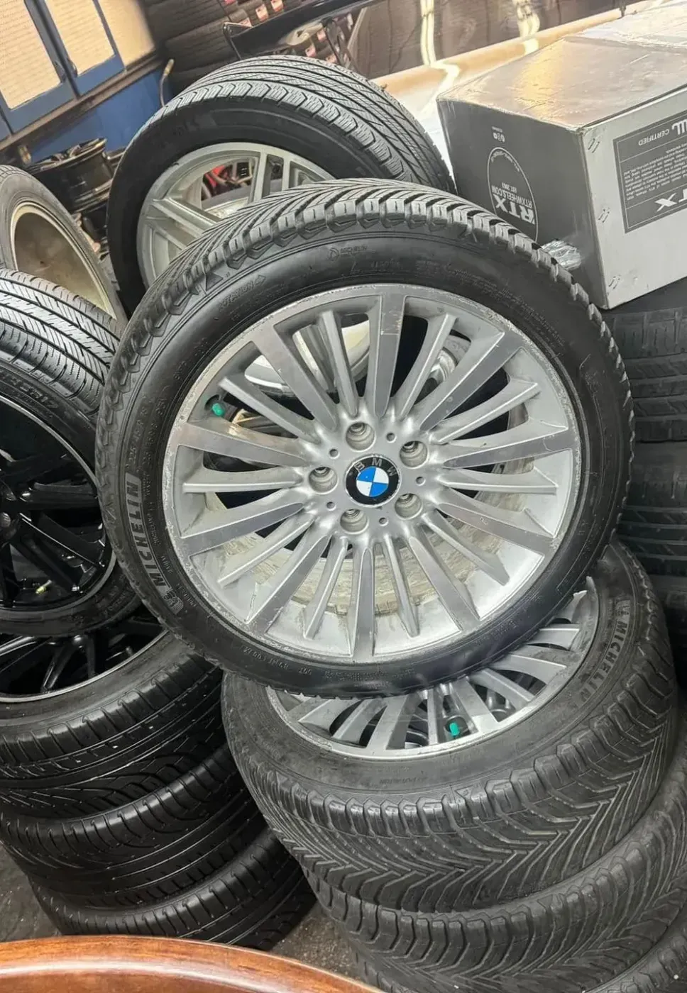 A store filled with lots of tires and a fire extinguisher.