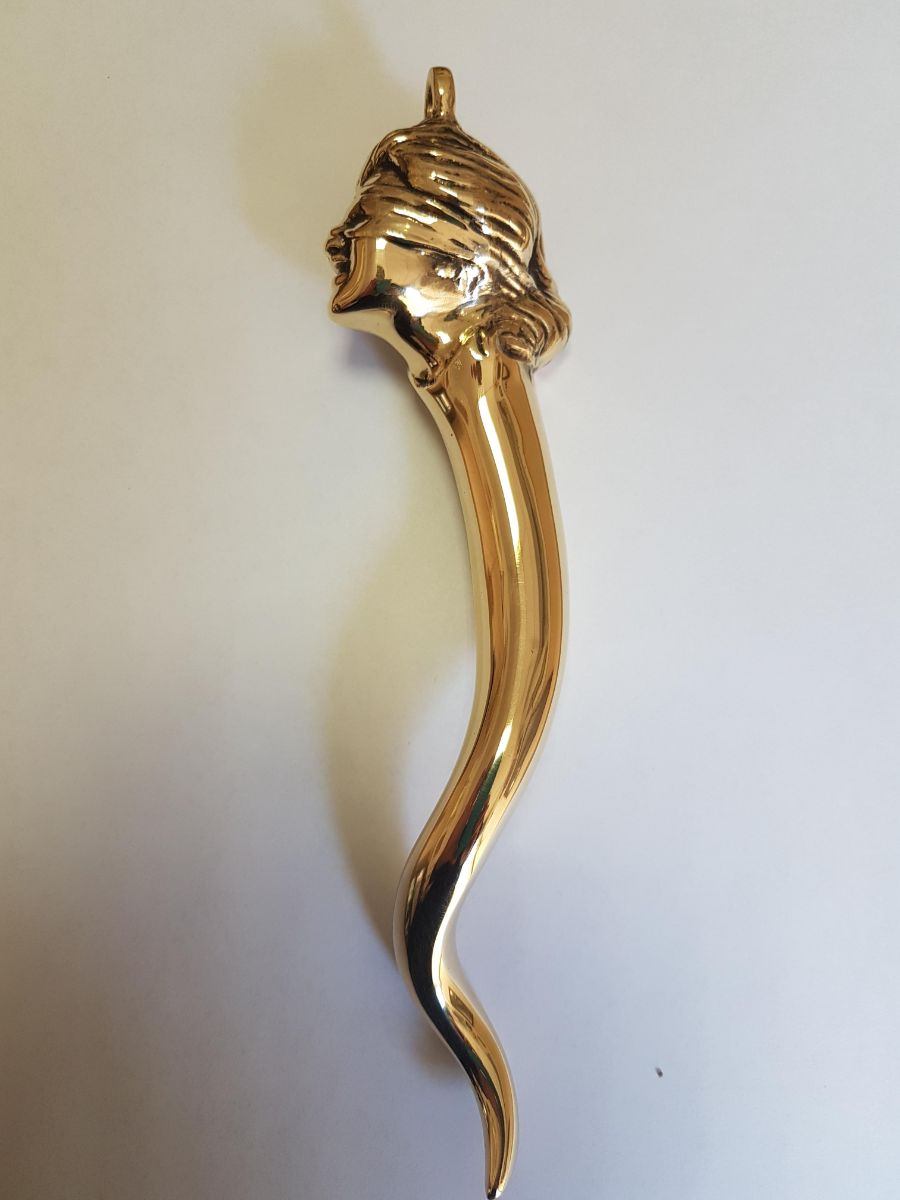 corno in metallo artigianale