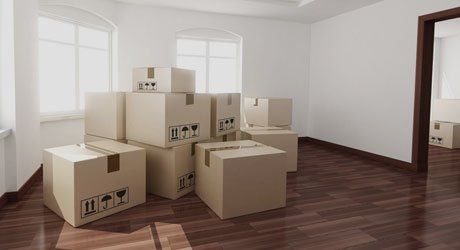 cardboard boxes arranged in a room