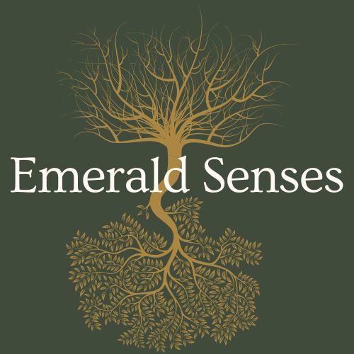 A upside down tree logo in yellow on moss green background, with the words "Emerald Senses" in the middle across.