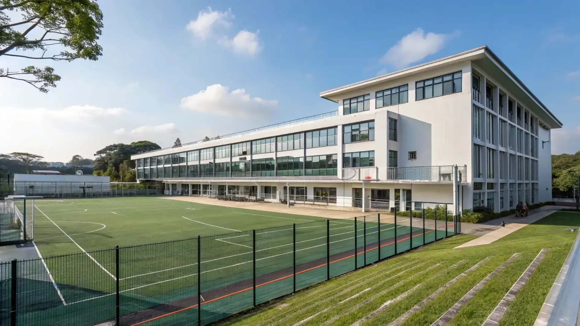 An aerial view of a building under construction with a chimney on the roof.