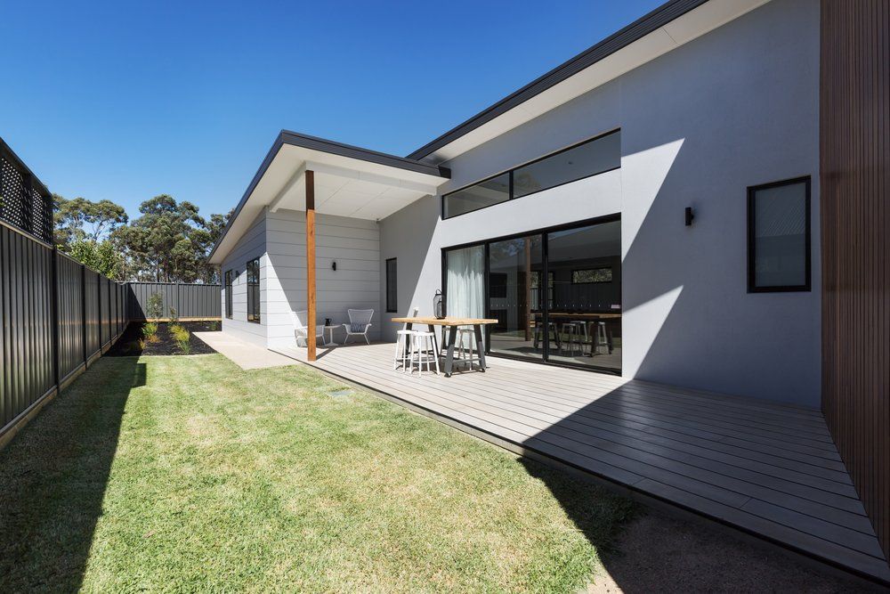 Modern House With Tinted Doors — Window Tinting In Toormina, NSW