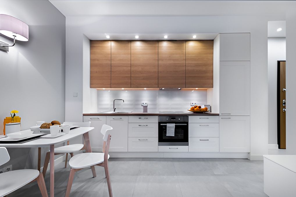 A Kitchen with A Table and Chairs in It