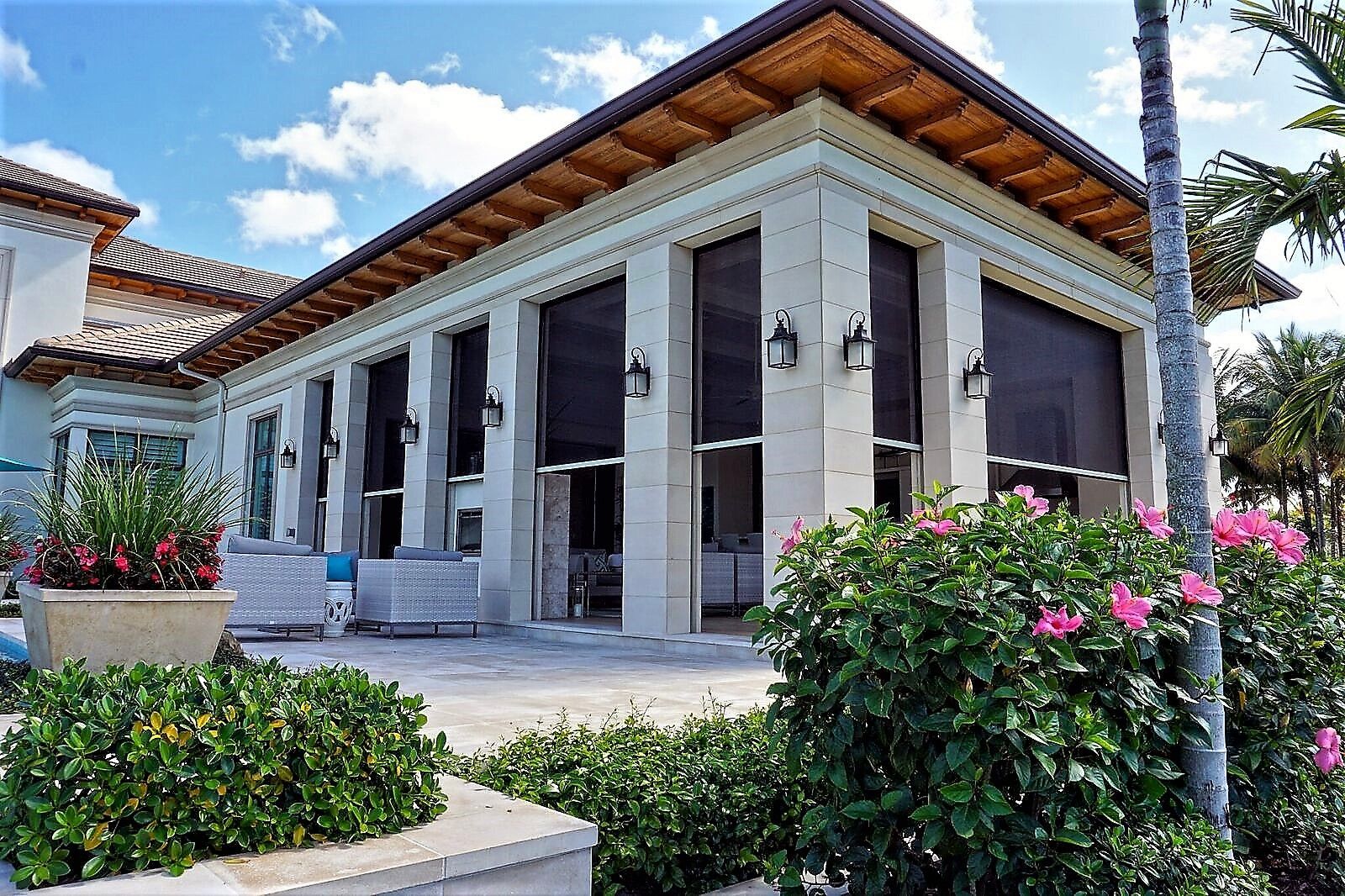 Enjoy your outdoor living areas with MagnaTrack motorized outdoor screens installed by Serenity Screens and Outdoor.