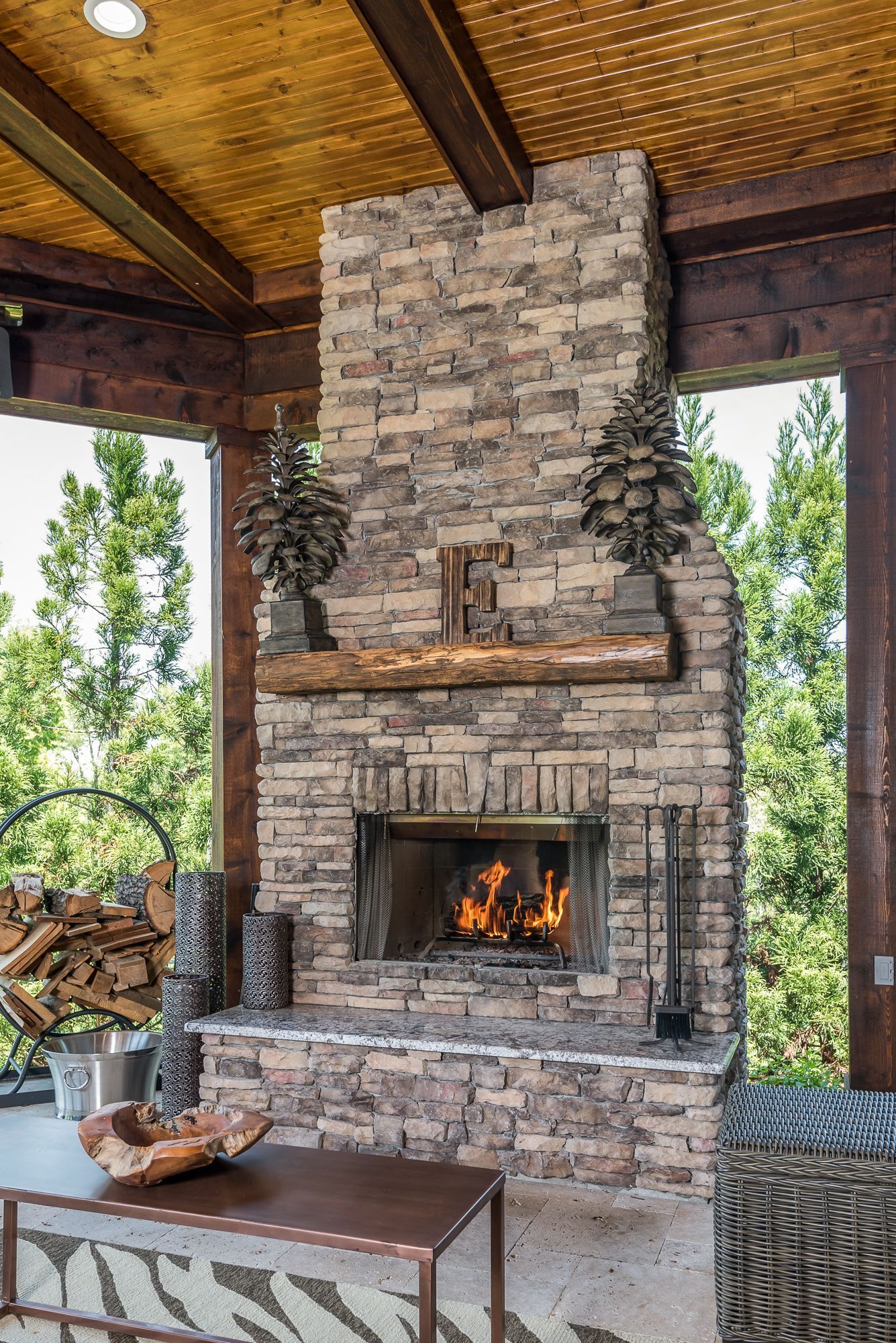 There is a fireplace in the middle of the room.