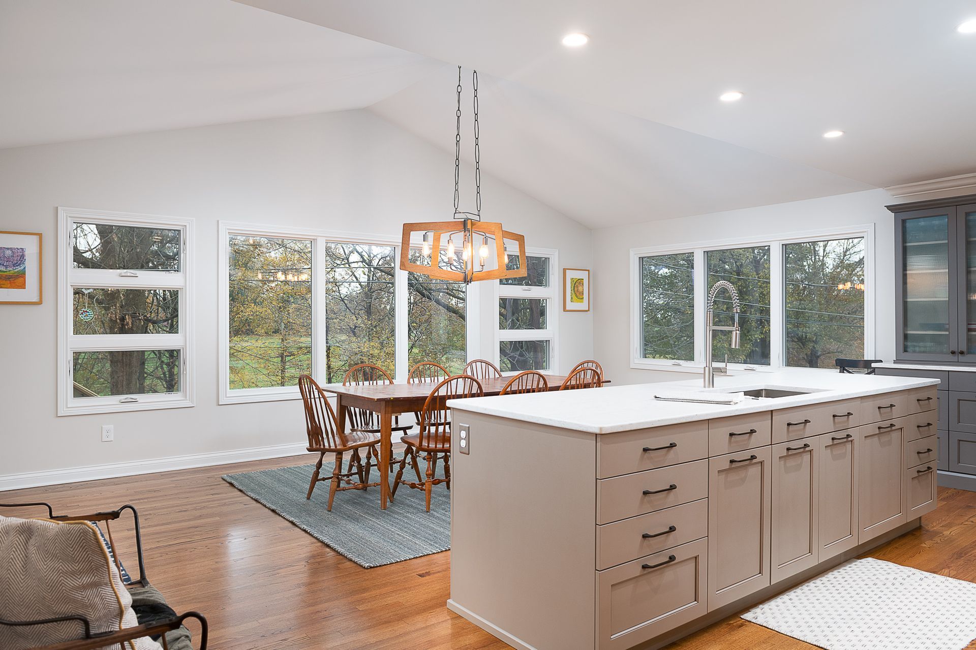 A kitchen with a large island in the middle of the room.