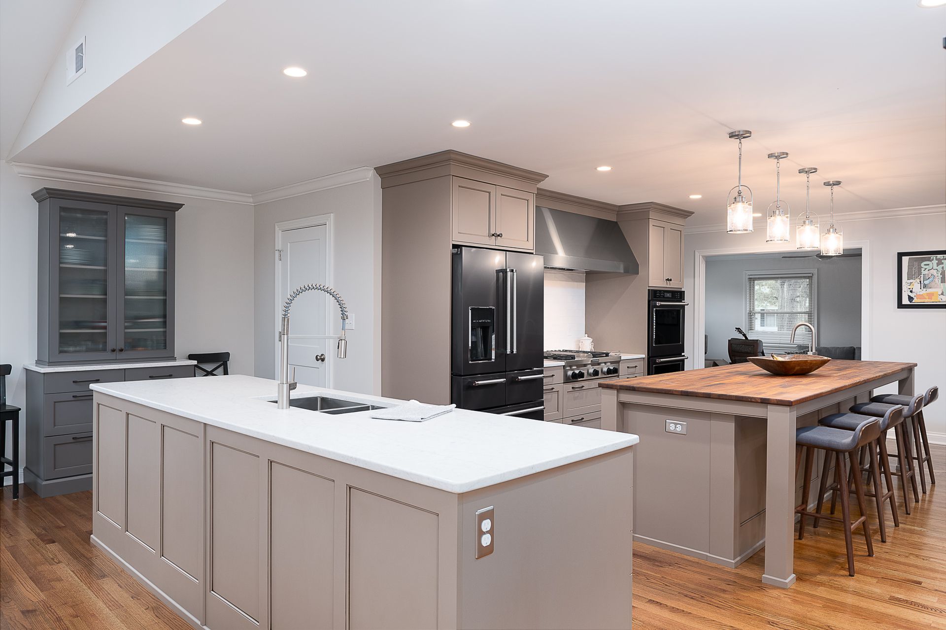 There is a large island in the middle of the kitchen.