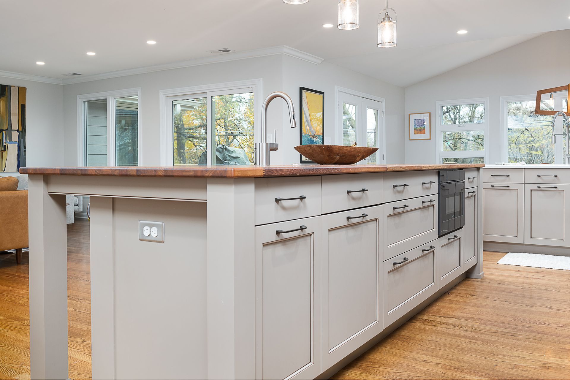 There is a large island in the middle of the kitchen.