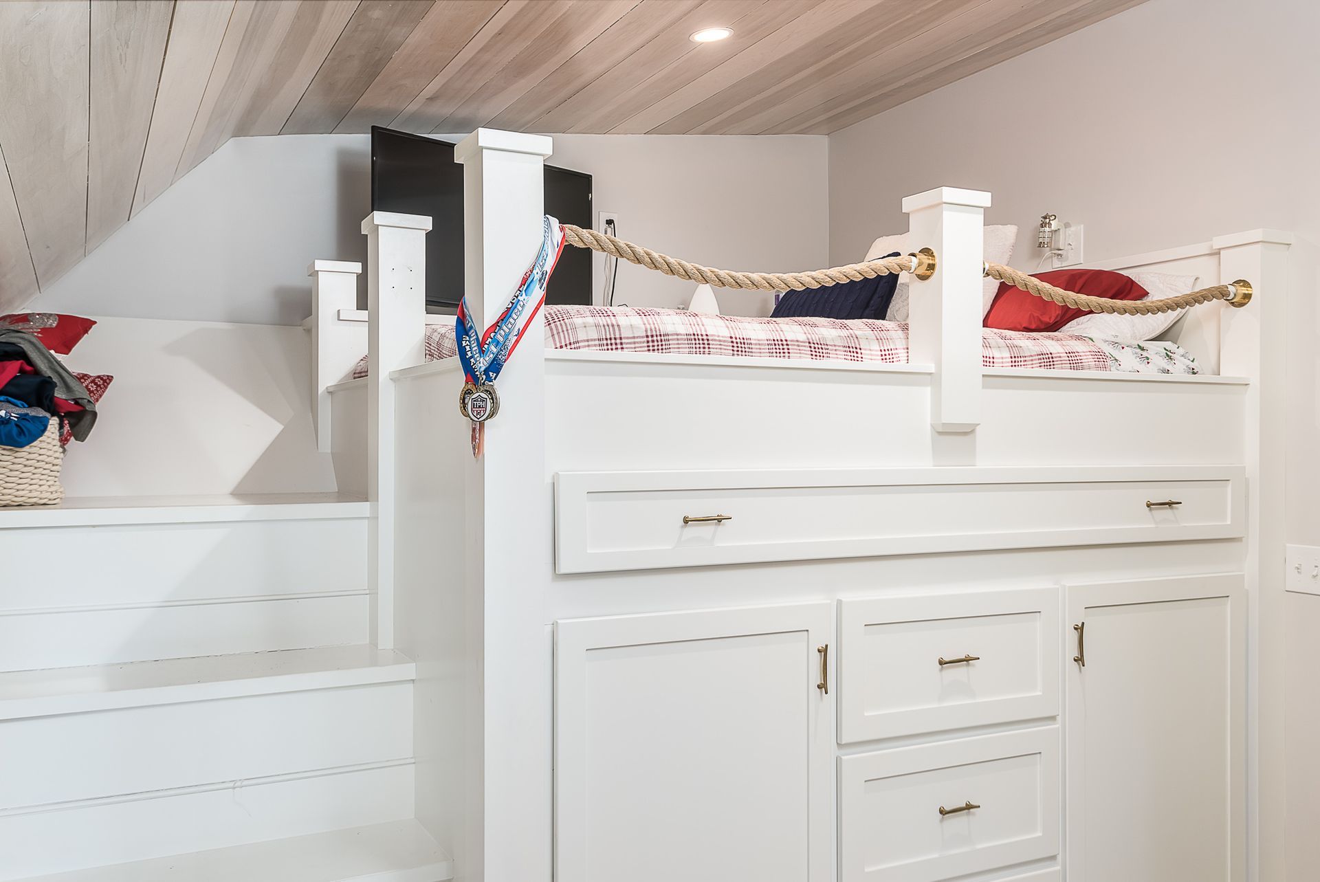 There is a bunk bed in the corner of the room.