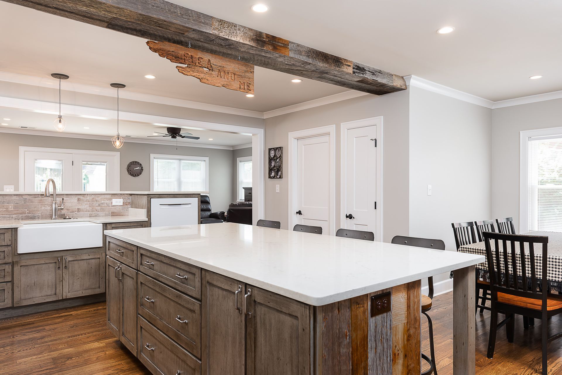 There is a large island in the middle of the kitchen.