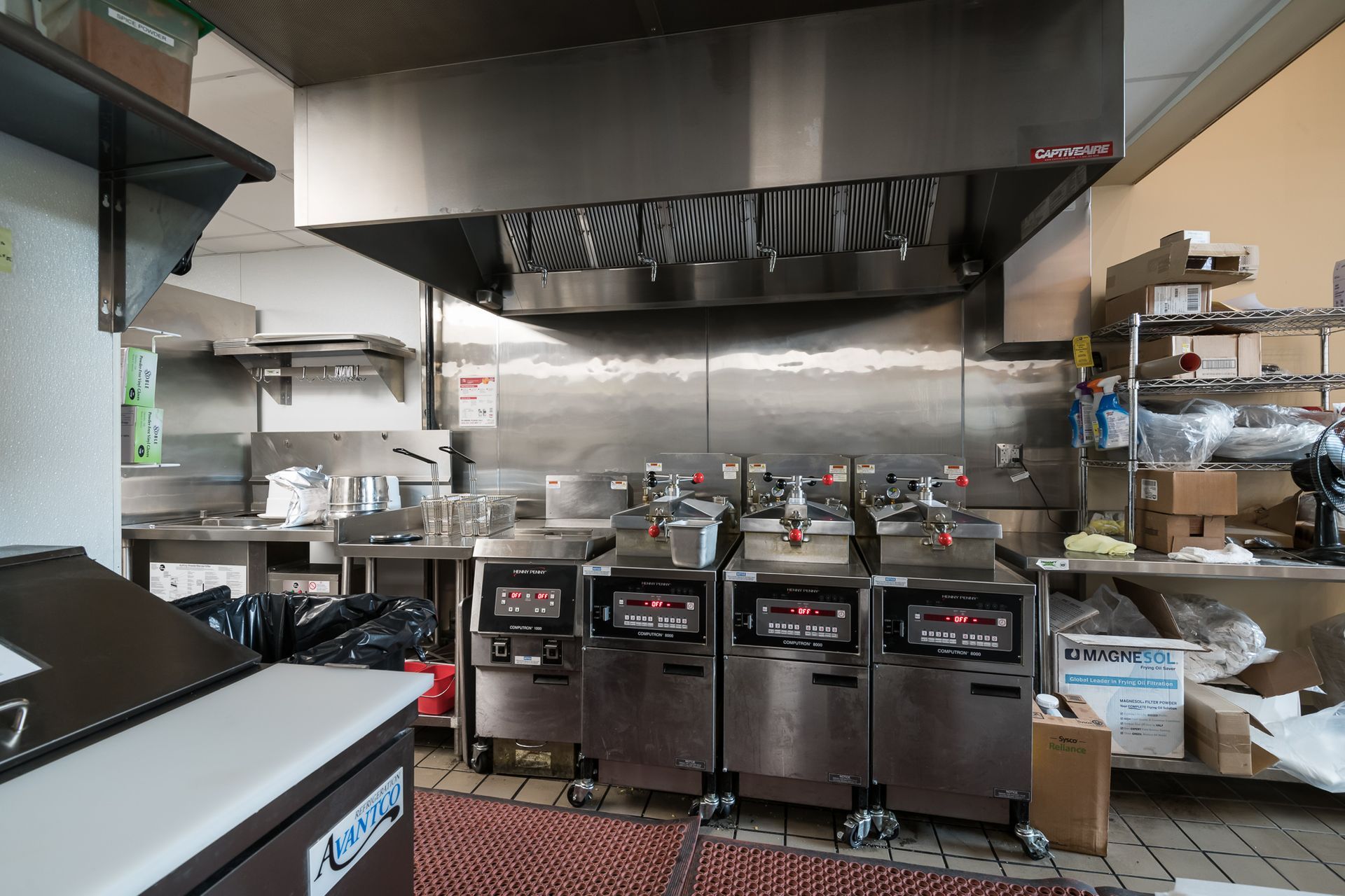 A kitchen with a lot of stainless steel appliances