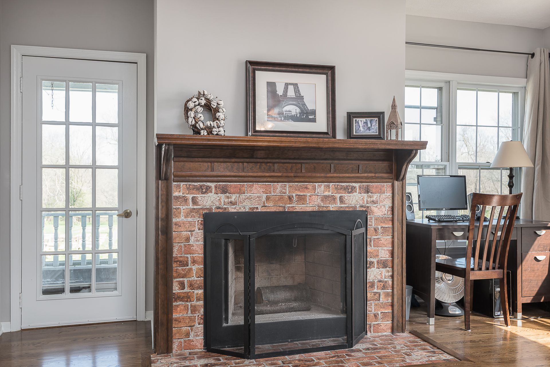 There is a fireplace in the middle of the room.