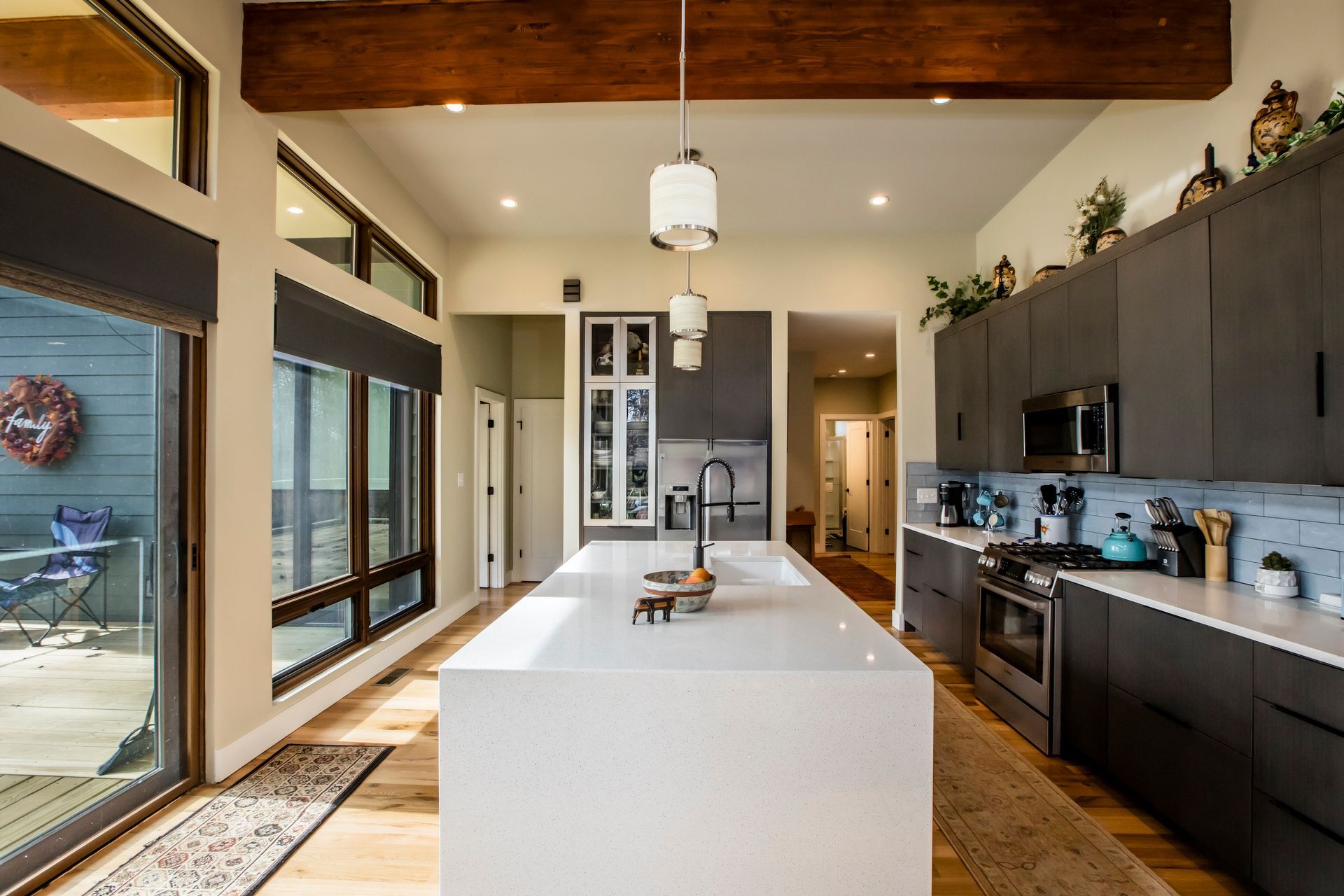 There is a large island in the middle of the kitchen.
