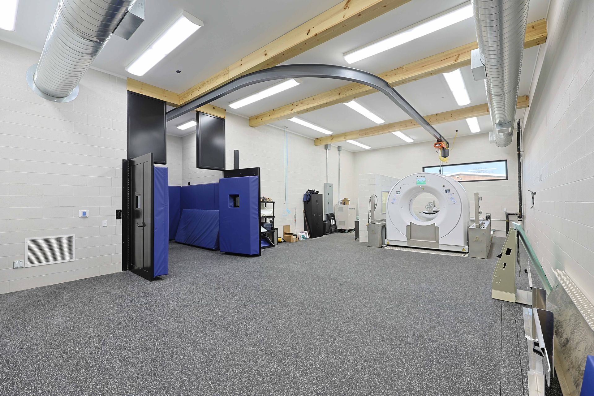 A large empty room with a lot of equipment in it.