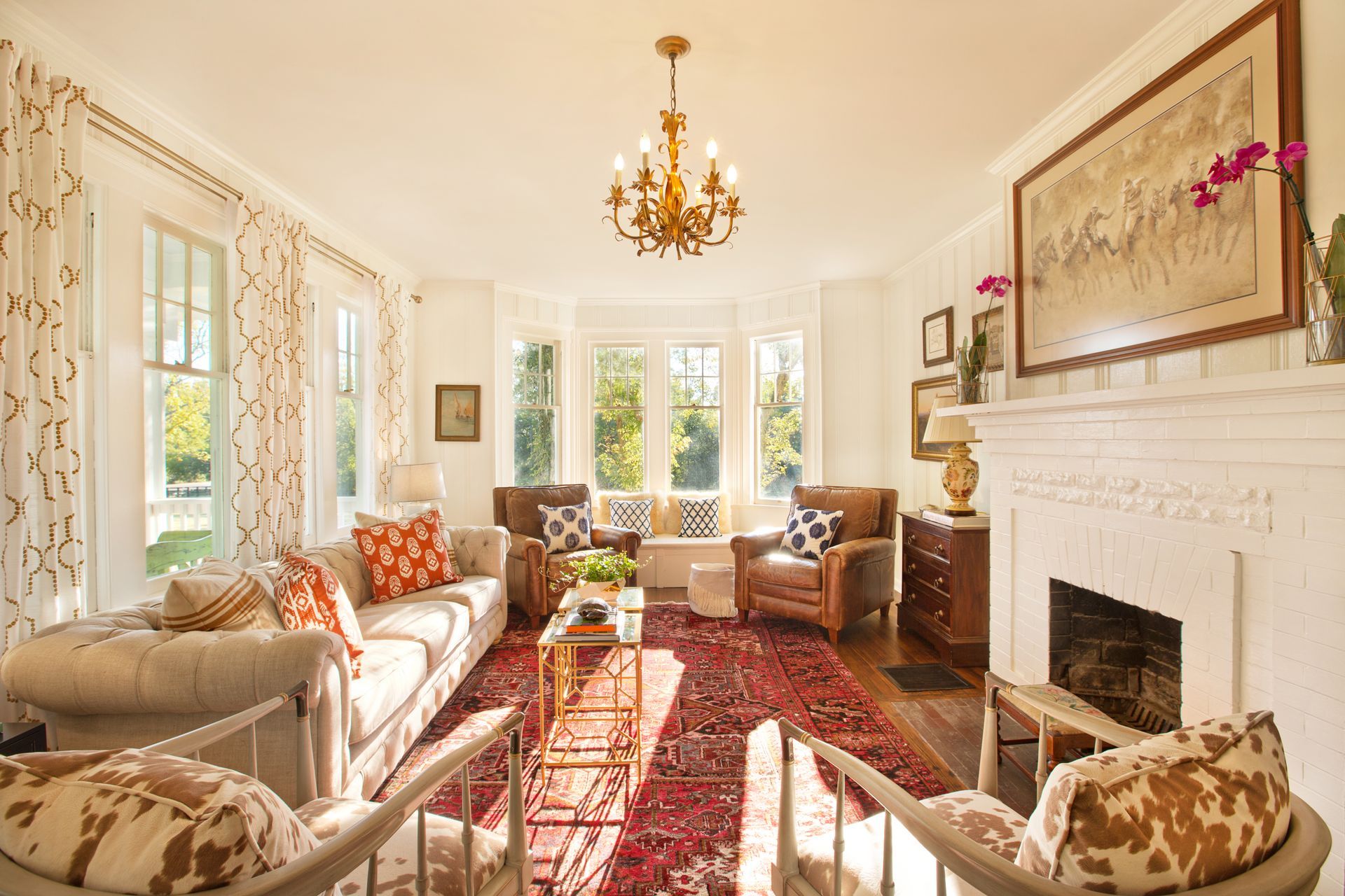 A living room filled with furniture and a fireplace.