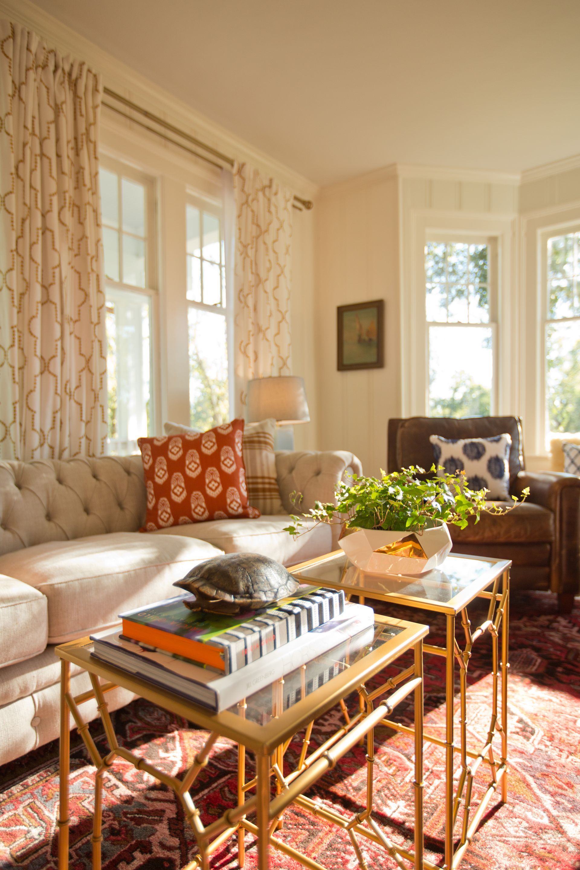 A living room with a couch and two coffee tables