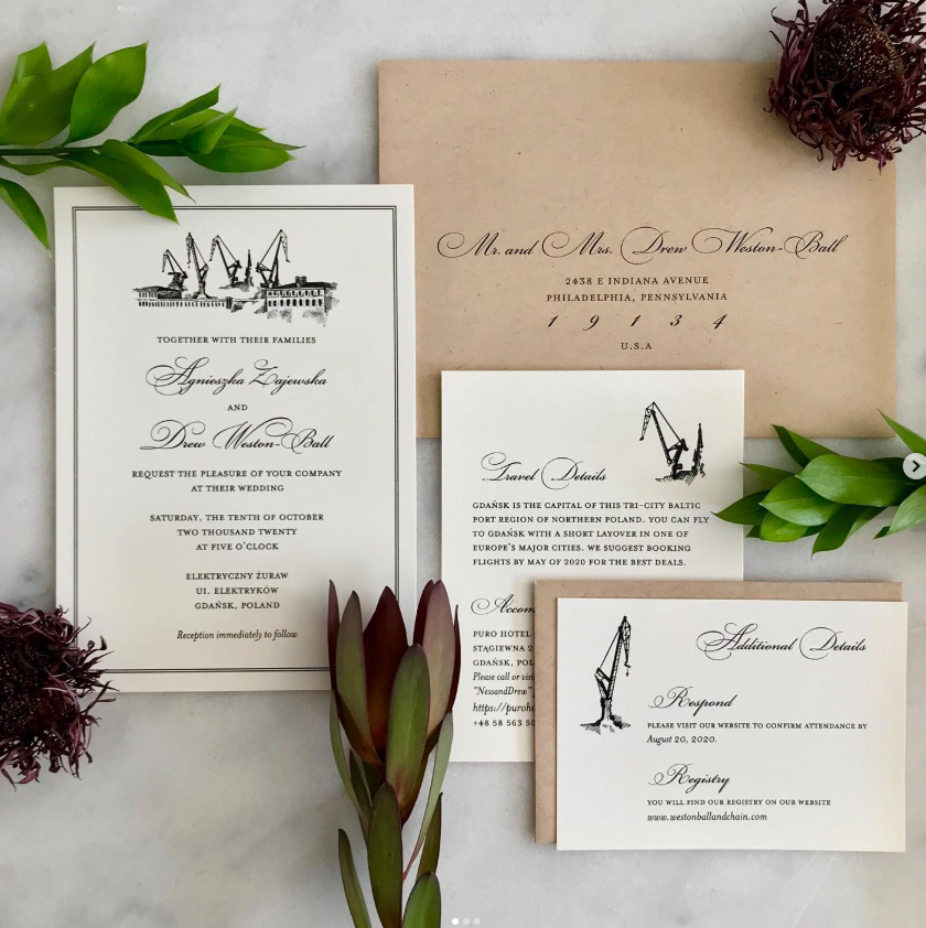 A wedding invitation sitting on top of a table