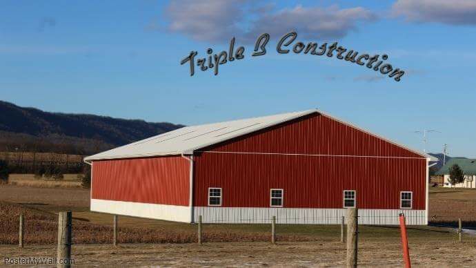 A red barn with a white roof is being built by triple b construction