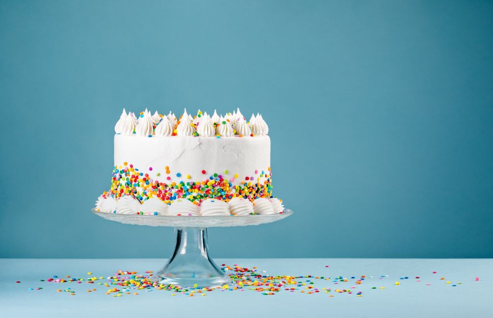 White Birthday Cake With Colorful Sprinkles