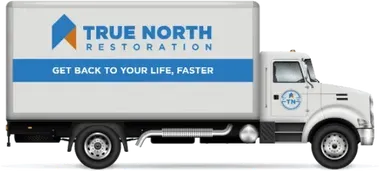 White True North Restoration truck with logo and tagline on a white background.