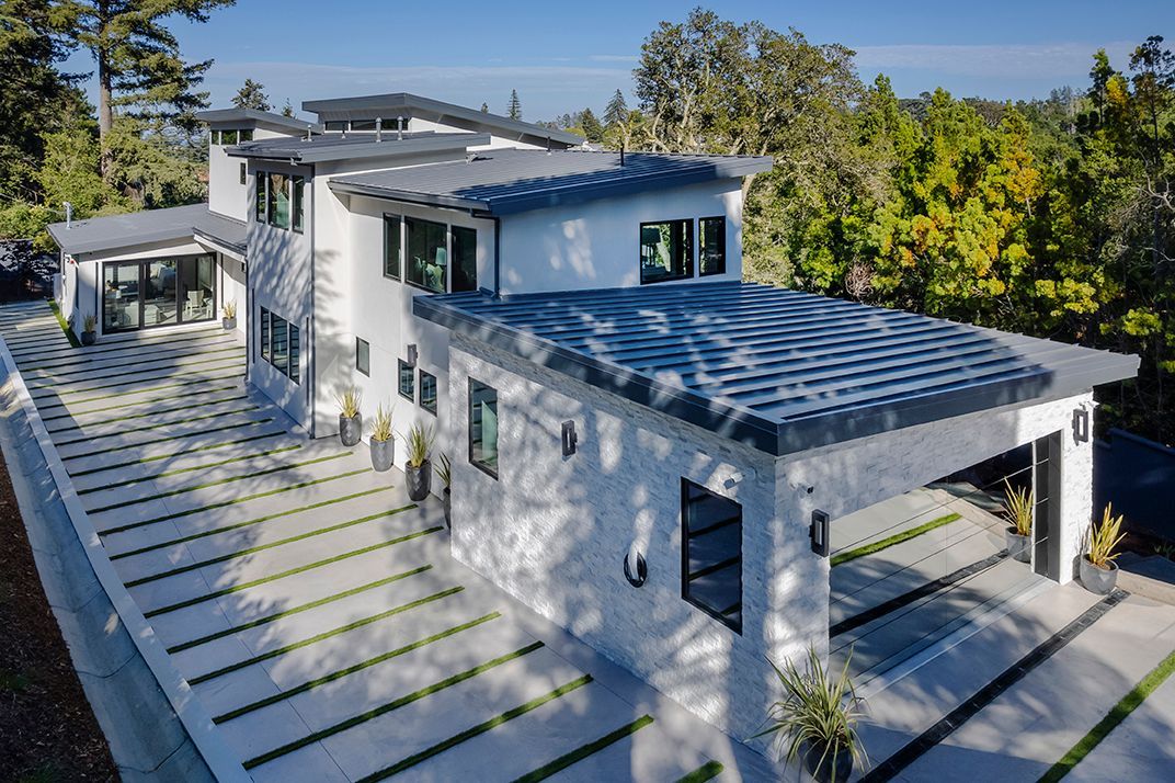 The new second story of the house elevates the house design 