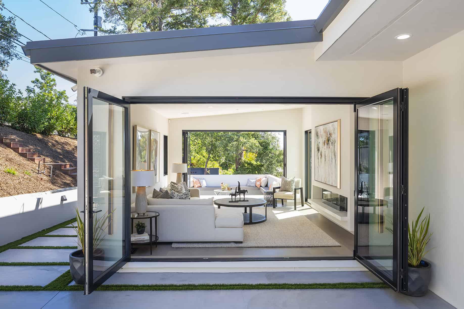 The family room opens to and connects the front and side yards