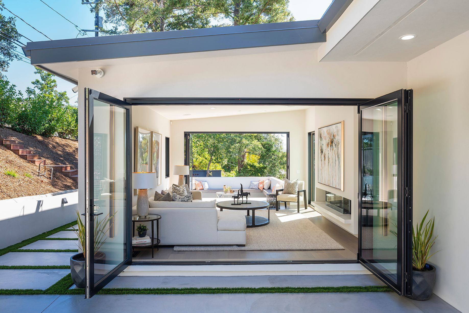 The family room opens to and connects the front and side yards