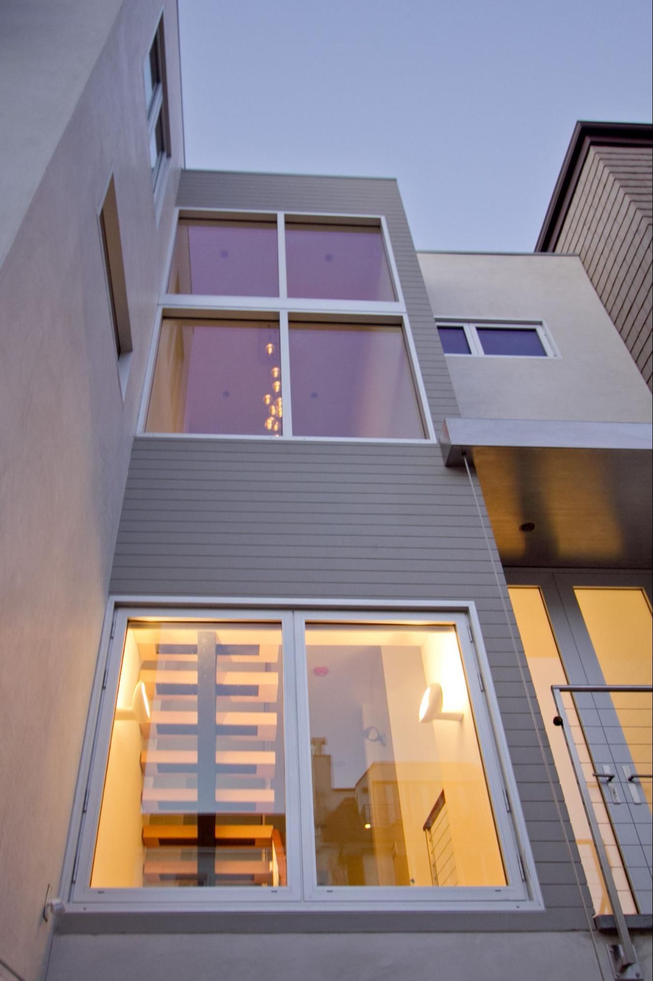 The floating stairs are visible from outside the townhouse