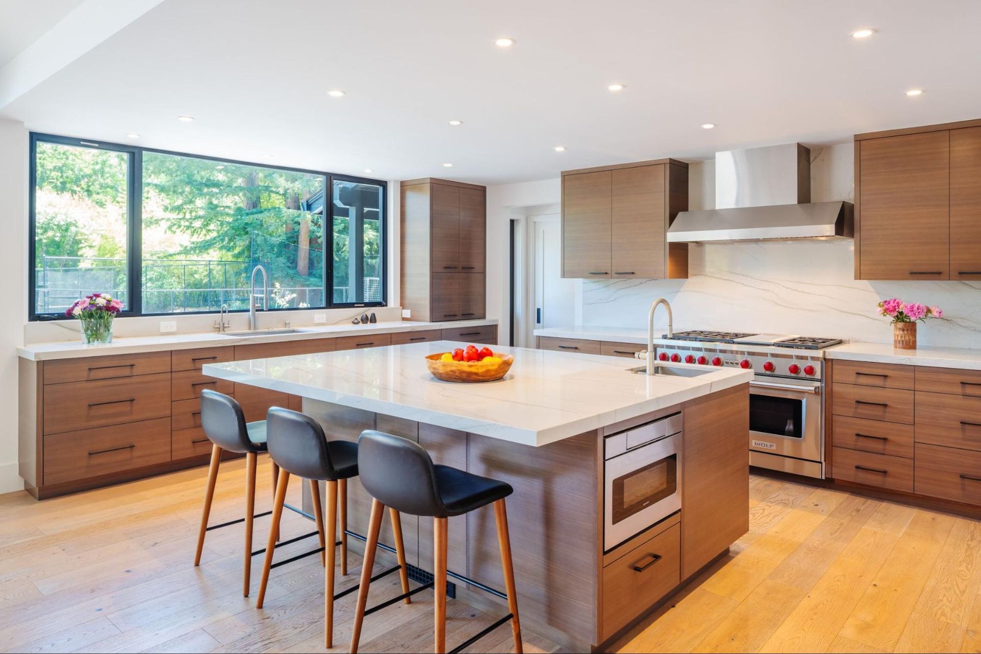 An island in the kitchen offers functionality and seating