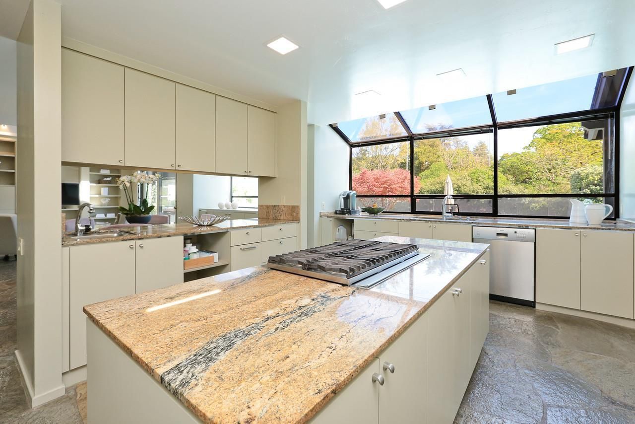 The existing kitchen was separate from the living spaces