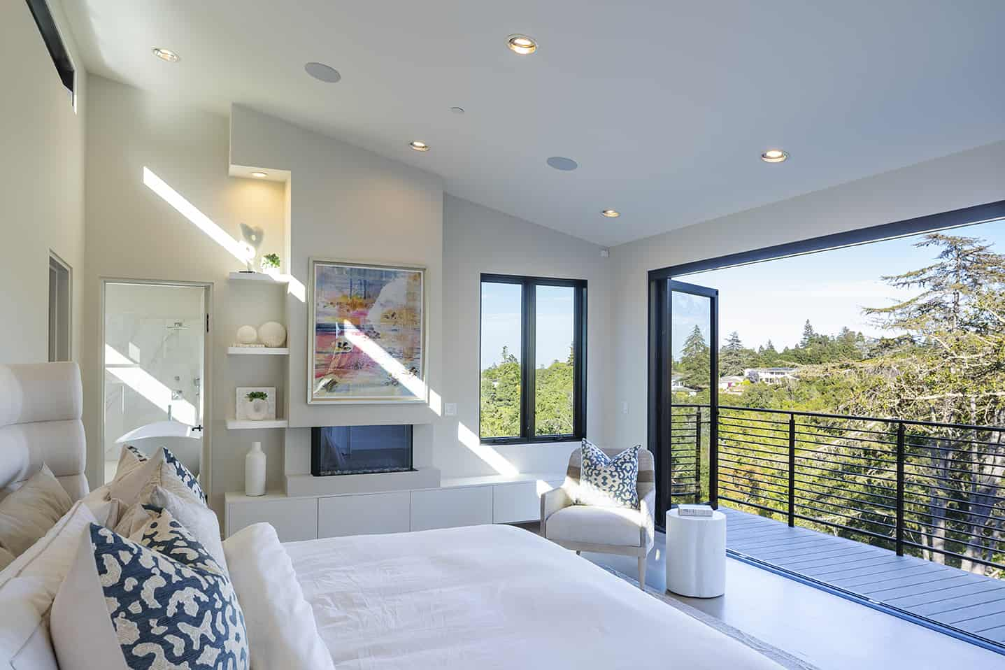 The master bedroom has bifold doors that open to a private terrace