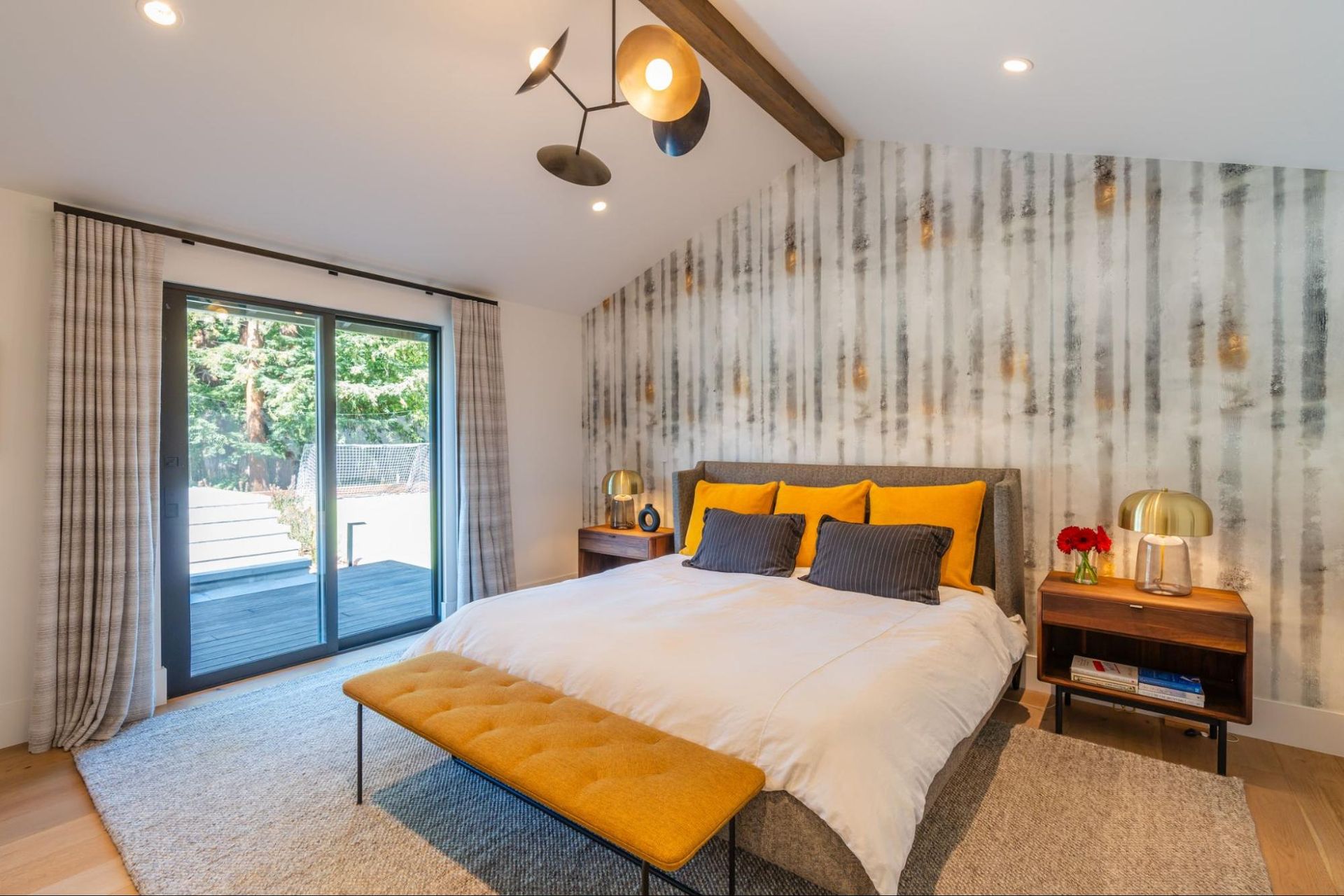 The master bedroom vaulted ceiling matches the great room