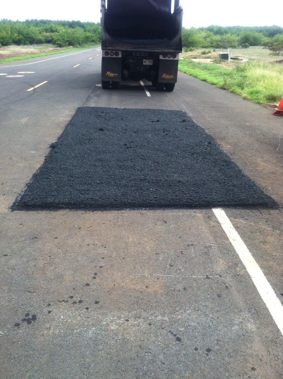 A road that needs asphalt repair