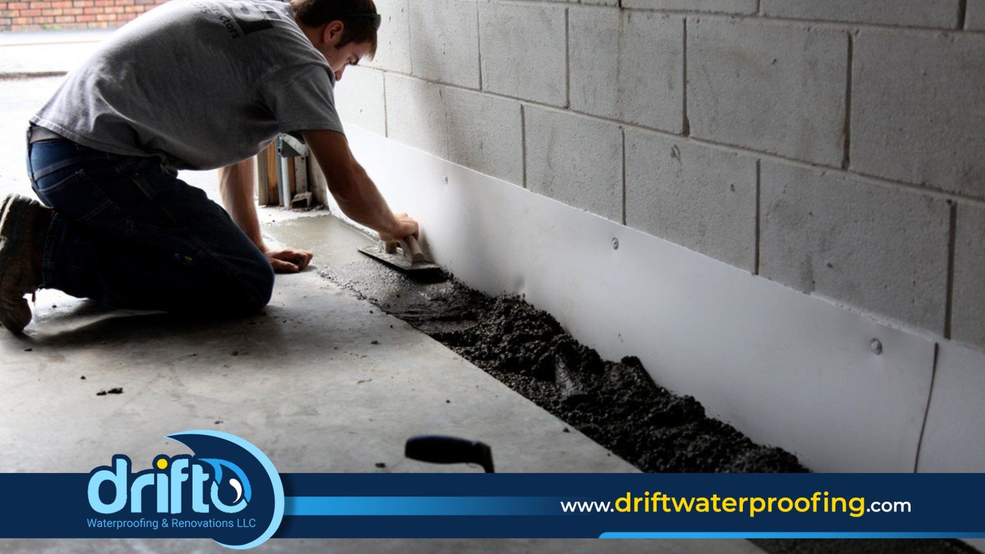 man waterproofing a basement of a house