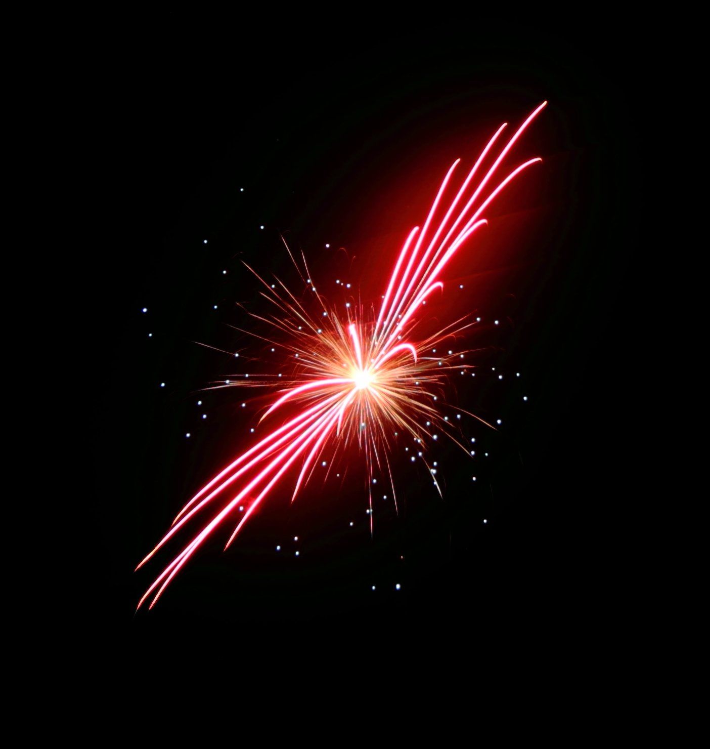 A red fireworks display in the night sky