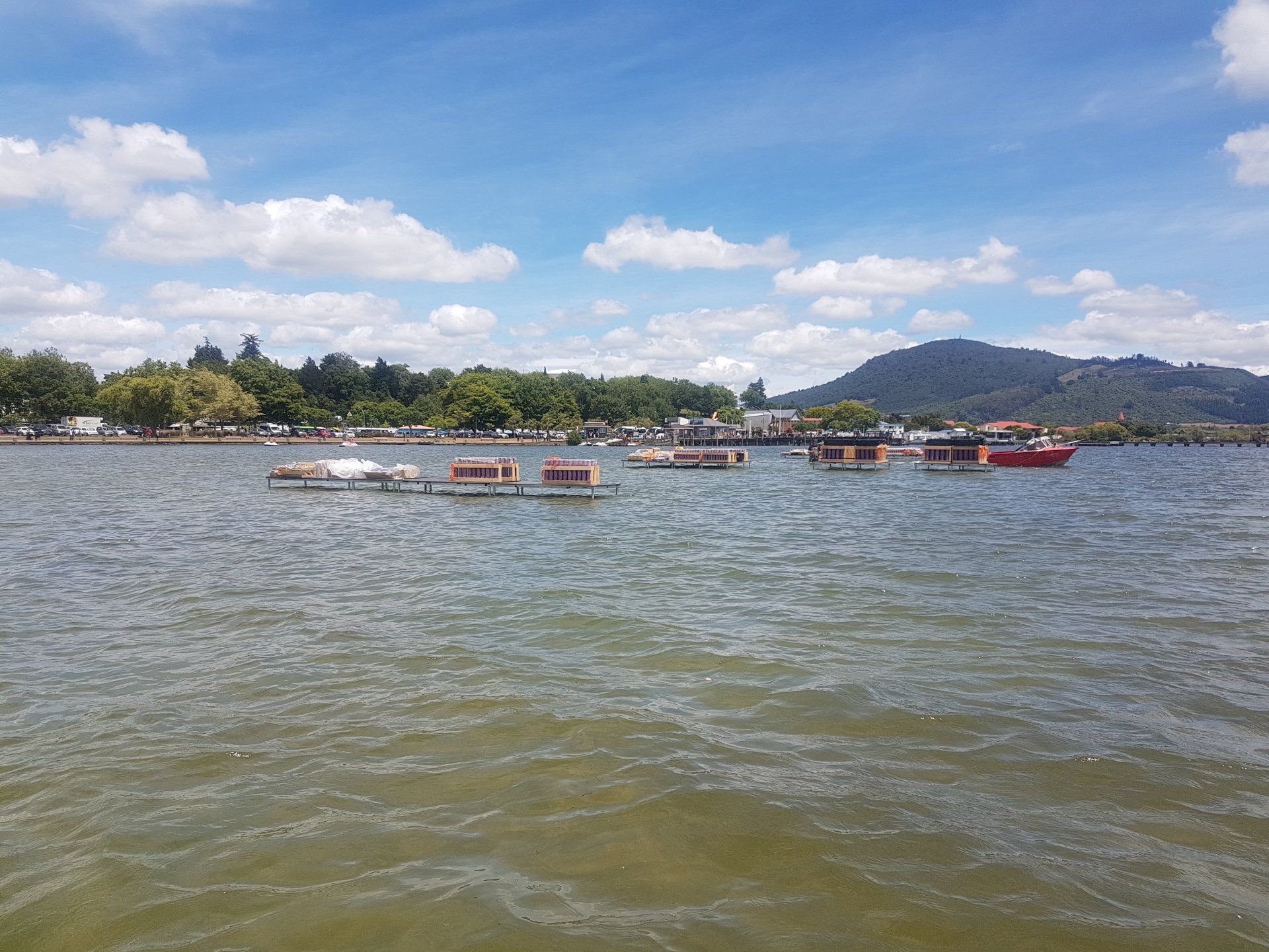 A group of barges ready for a fireworks display in rotorua