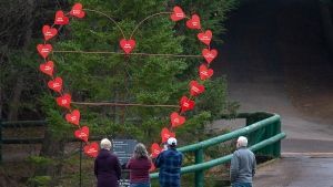 Visitors pay their repects at a memorial honouring the victims of the April 2020 murder rampage in rural Nova Scotia, in Victoria Park in Truro, N.S