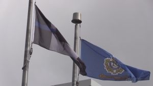 The Thin Blue Line Canadian flag flies outside the Ontario Provincial Police Association building in Barrie