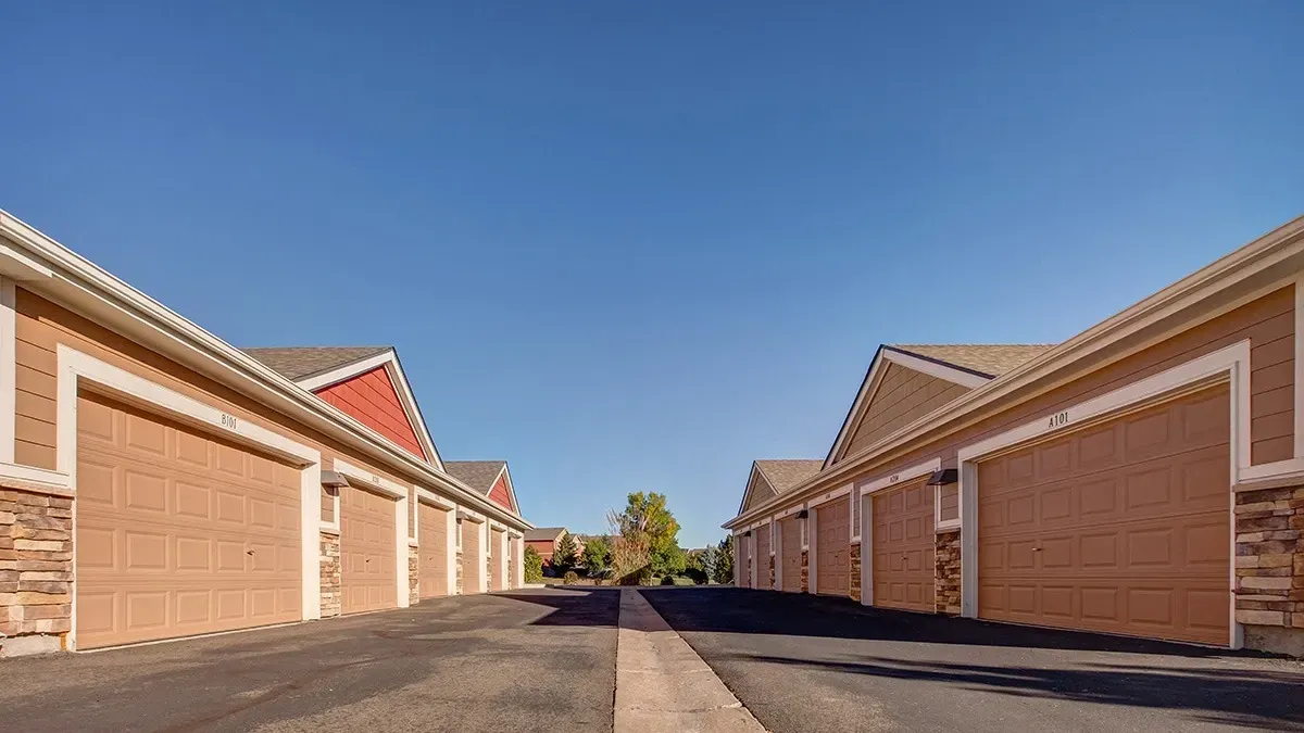 Exterior view of garages at an apartment complex.