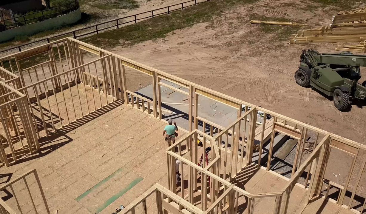 An aerial view of a house being built.