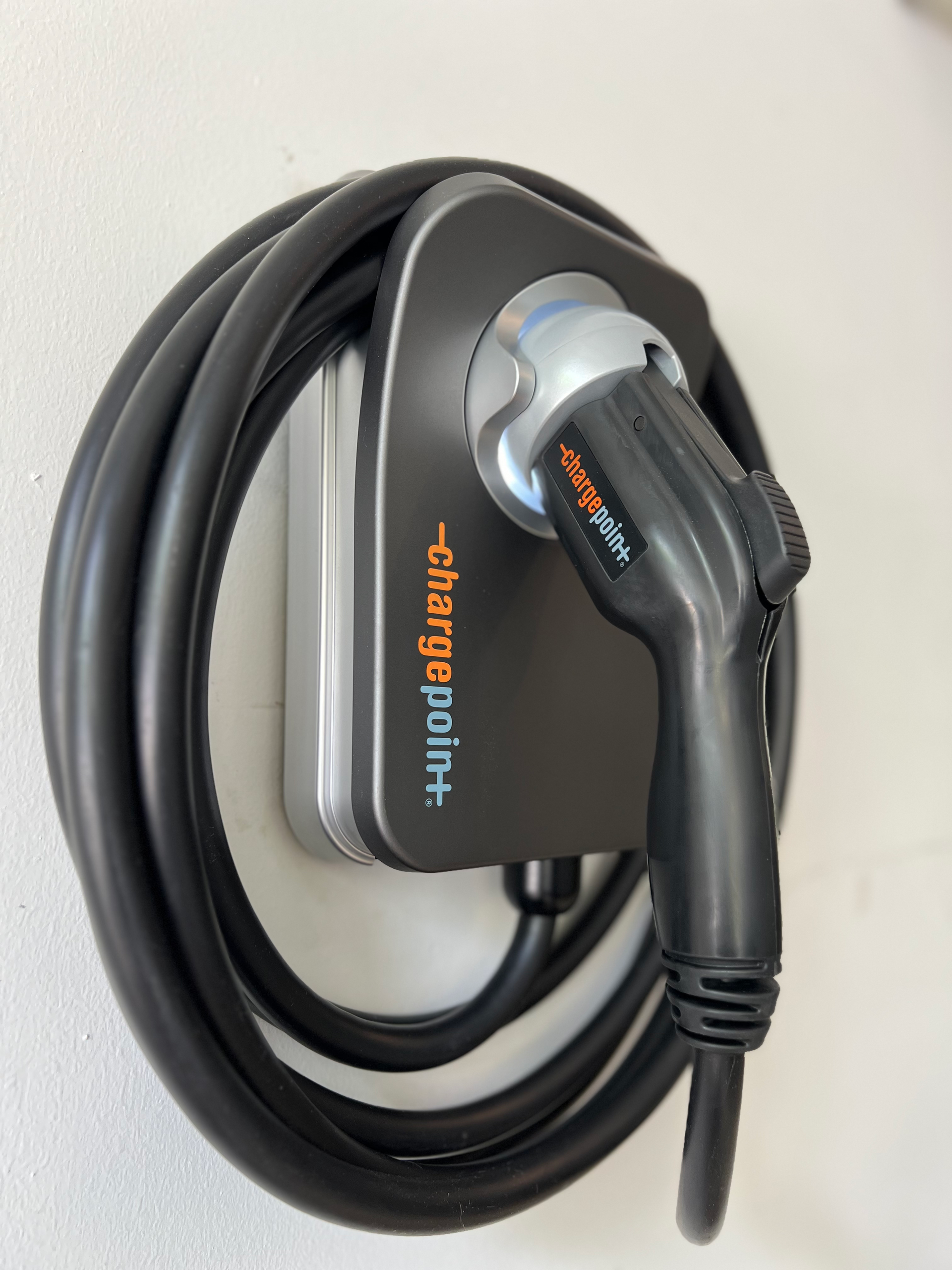 A charging point with a cord attached to it