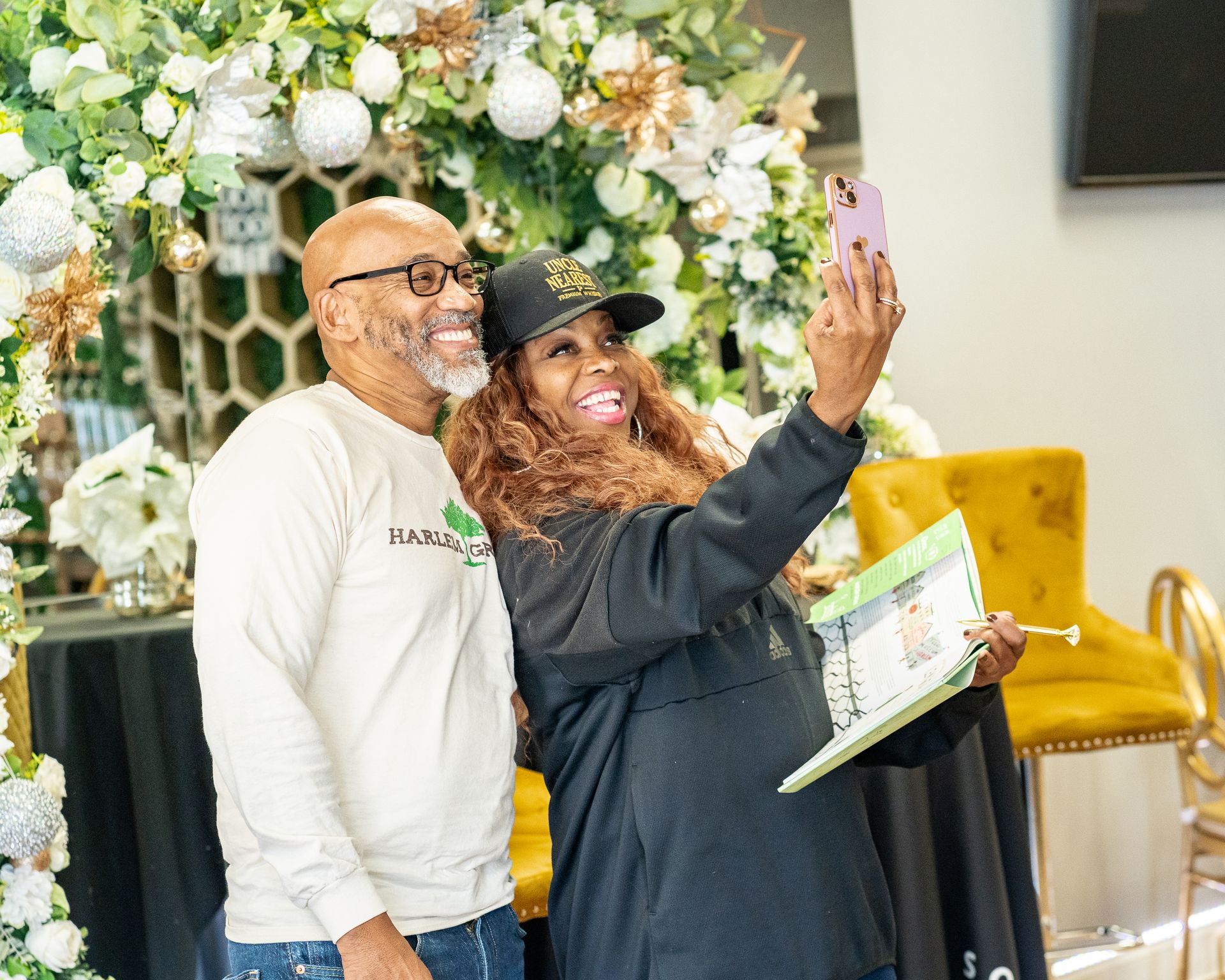 A man and a woman are taking a selfie together.