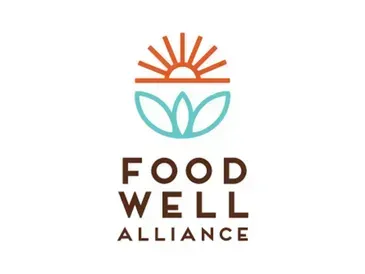 A logo for the food well alliance with a sun and leaves