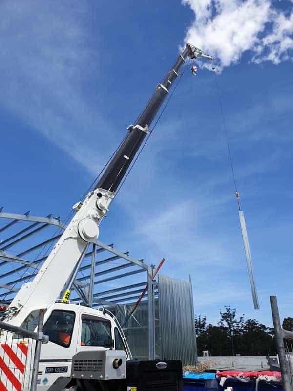 Crane At Construction Site — Ulladulla Crane Hire in Milton, NSW