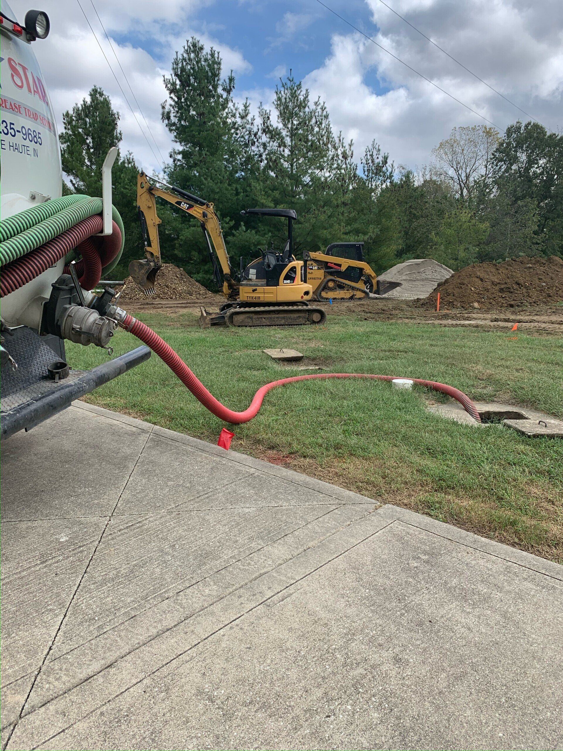 Truck Backside With Hose | Terre Haute, IN | All Star Sanitation Inc.
