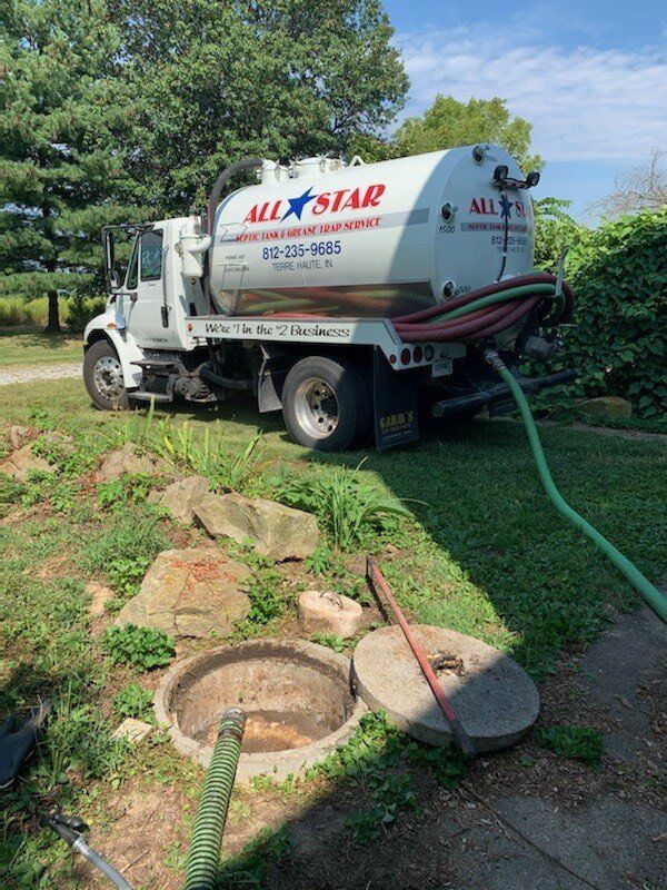 Truck Side With Hose | Terre Haute, IN | All Star Sanitation Inc.
