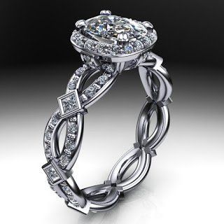 A white gold ring with a diamond in the center